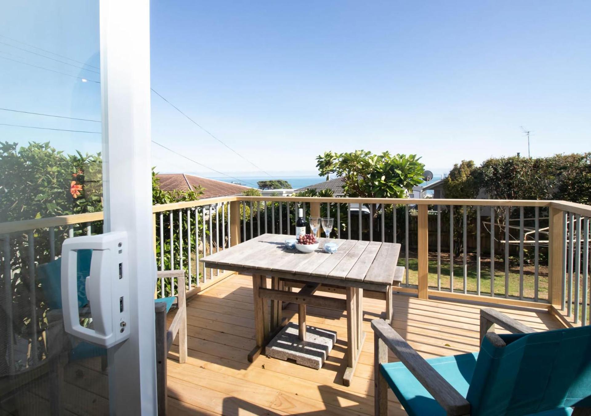 Blue Water Cottage - with beachfront coastal views view 3