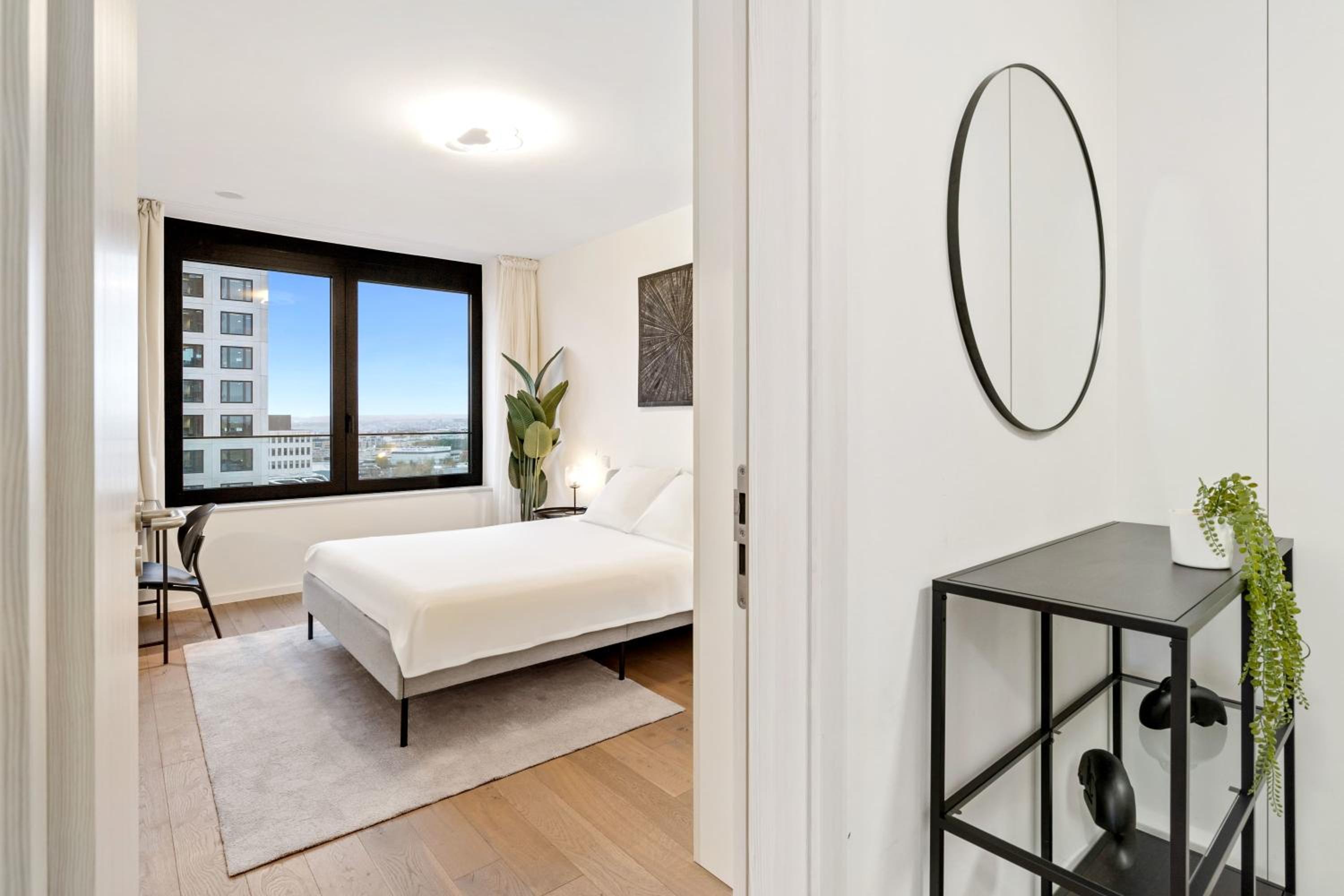 Modern 2BR Apartment with Pool & City Views view 3