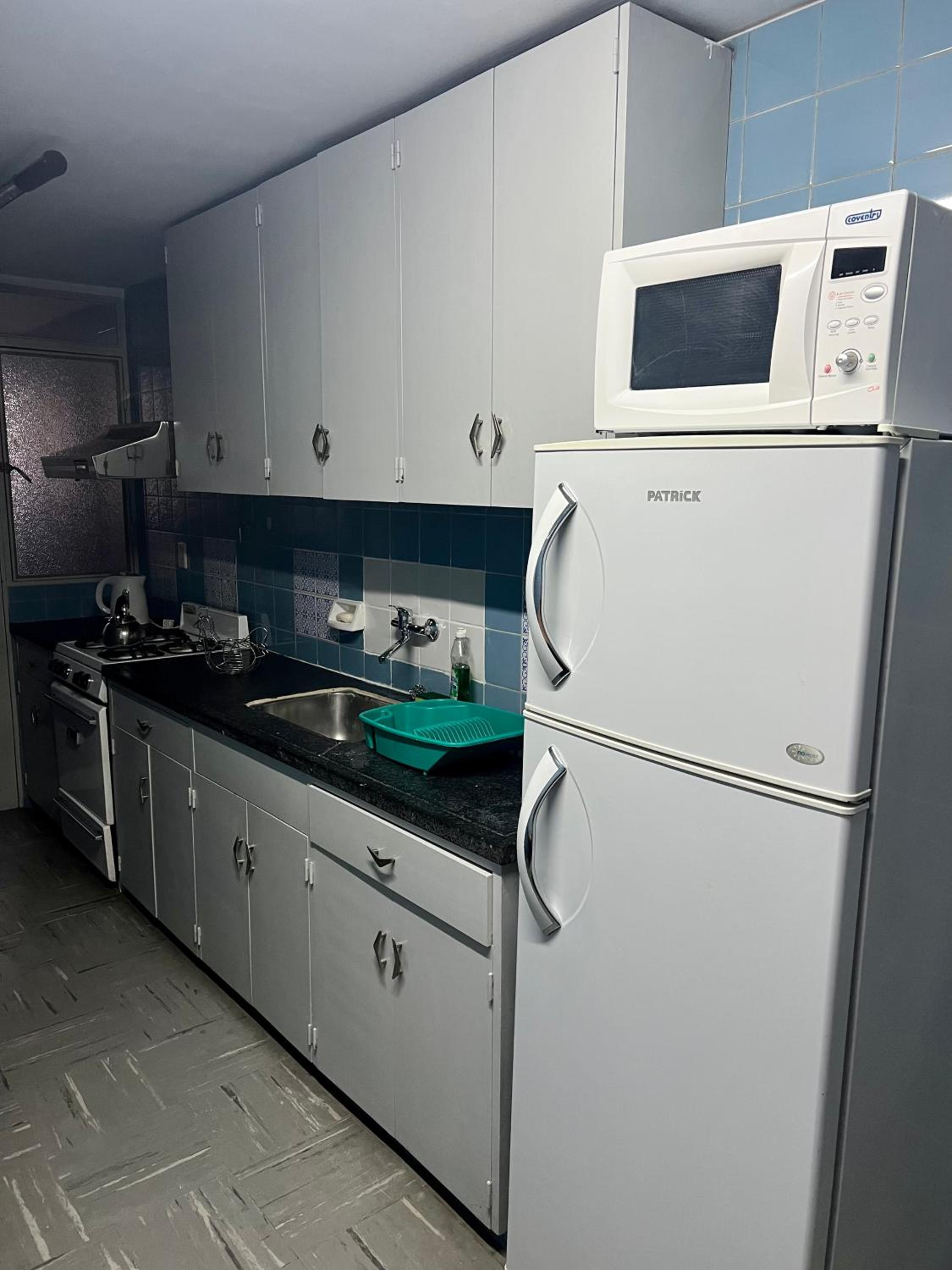 DEPARTAMENTO CÉNTRICO CON COCHERA