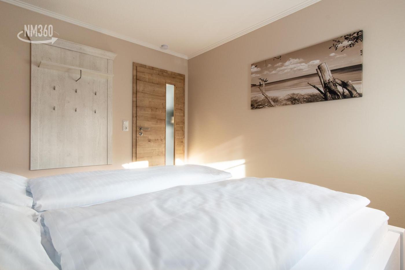 Ferienwohnanlage ODINs Blick - Wohnung 17 - direkt am Privatstrand, mit Sauna, Garten