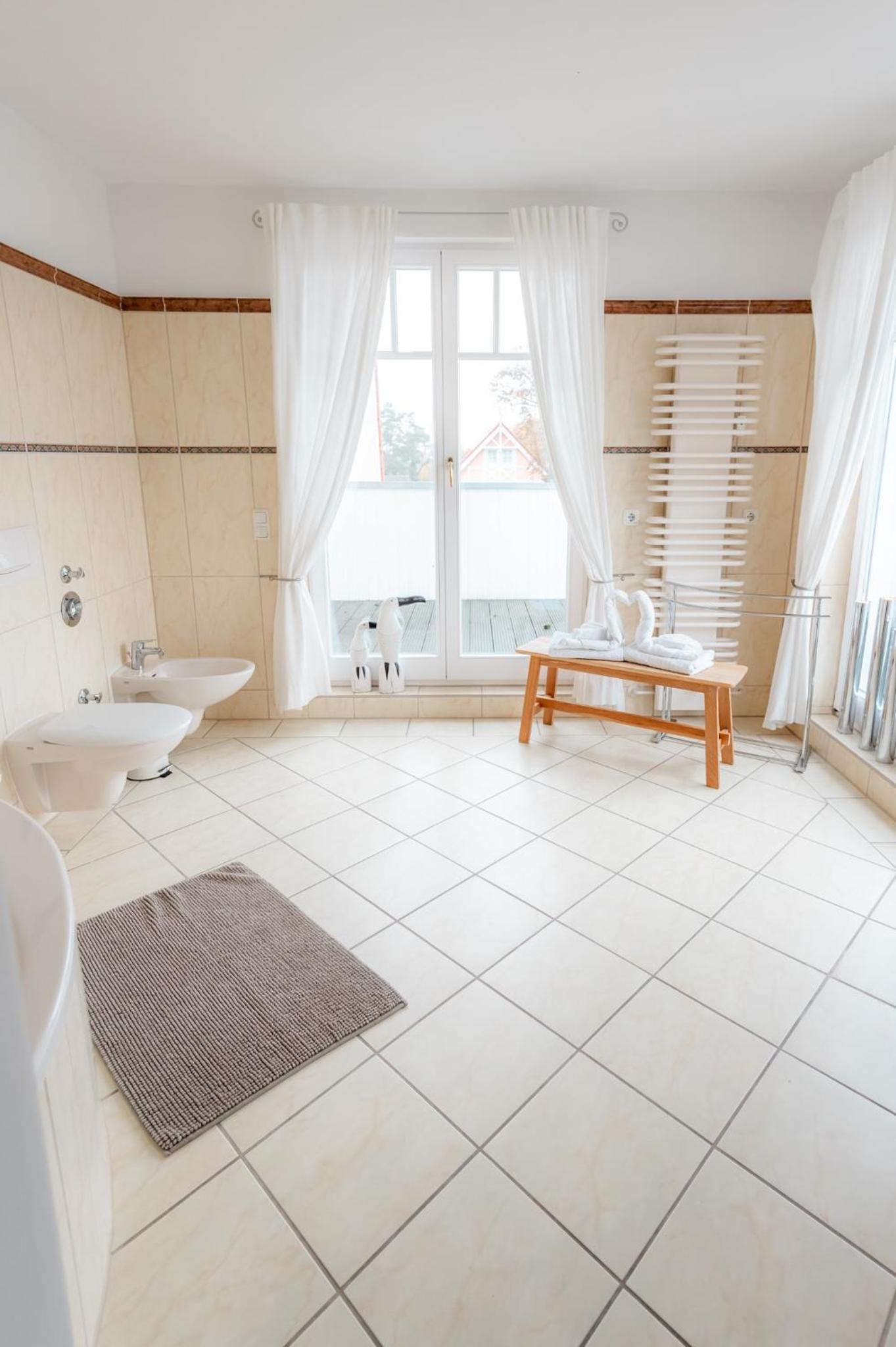 Villa Düne mit großer Sonnenterrasse, Kamin, Wlan und Tiefgarage für 2-4 Personen