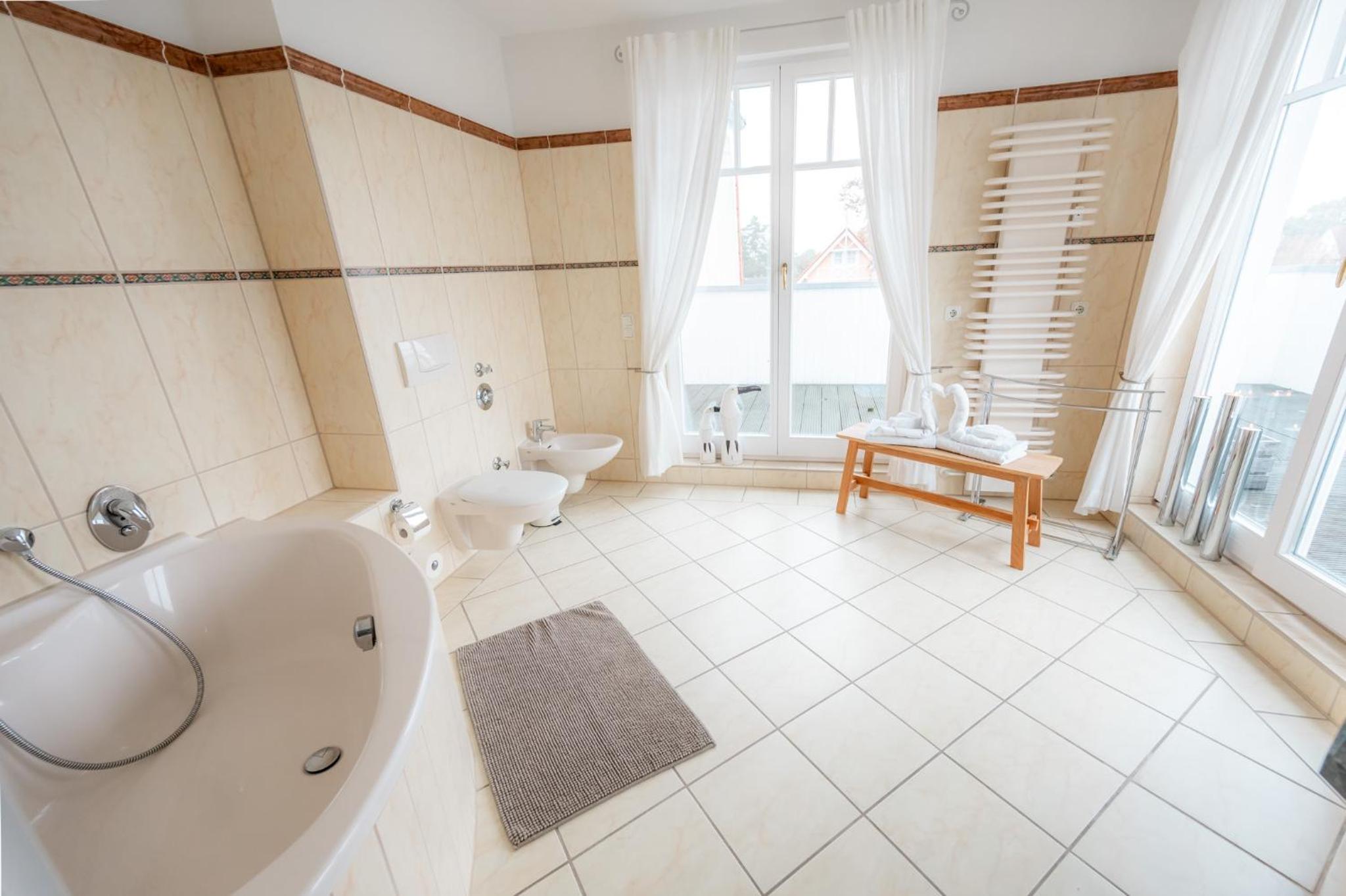 Villa Düne mit großer Sonnenterrasse, Kamin, Wlan und Tiefgarage für 2-4 Personen