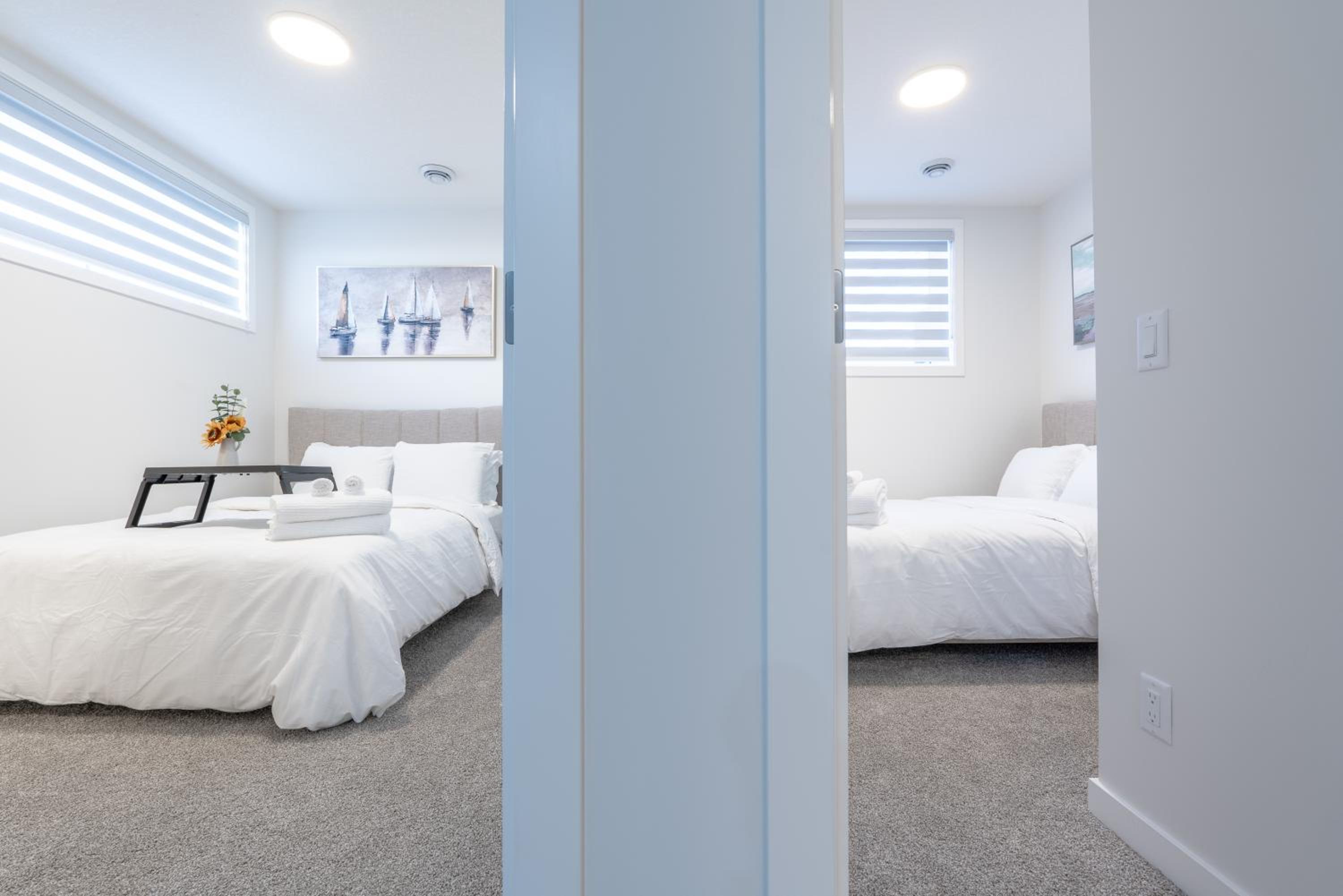 Stylish Getaway 2BD Basement by YMCA and South Health Campus Hospital