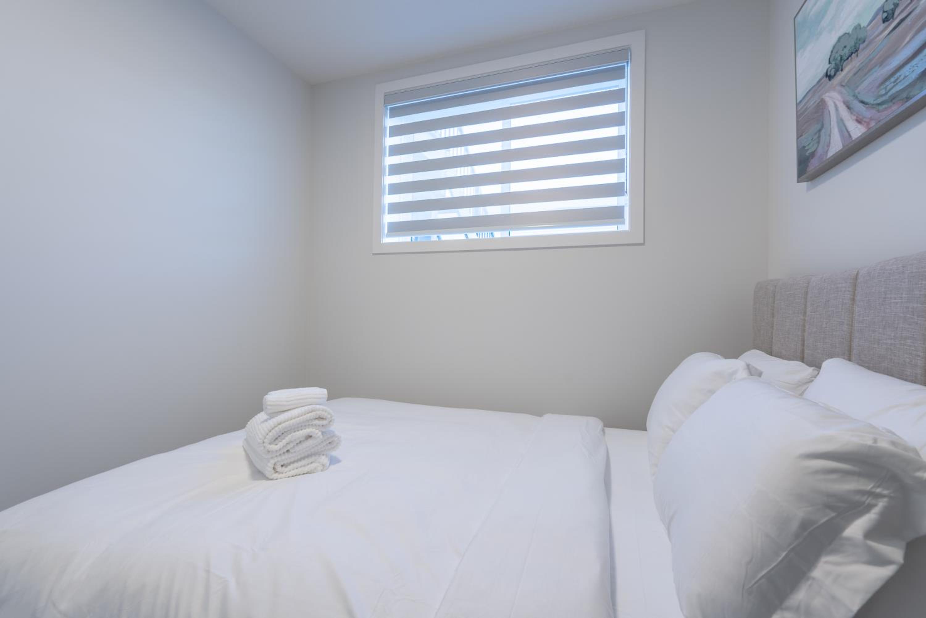 Stylish Getaway 2BD Basement by YMCA and South Health Campus Hospital