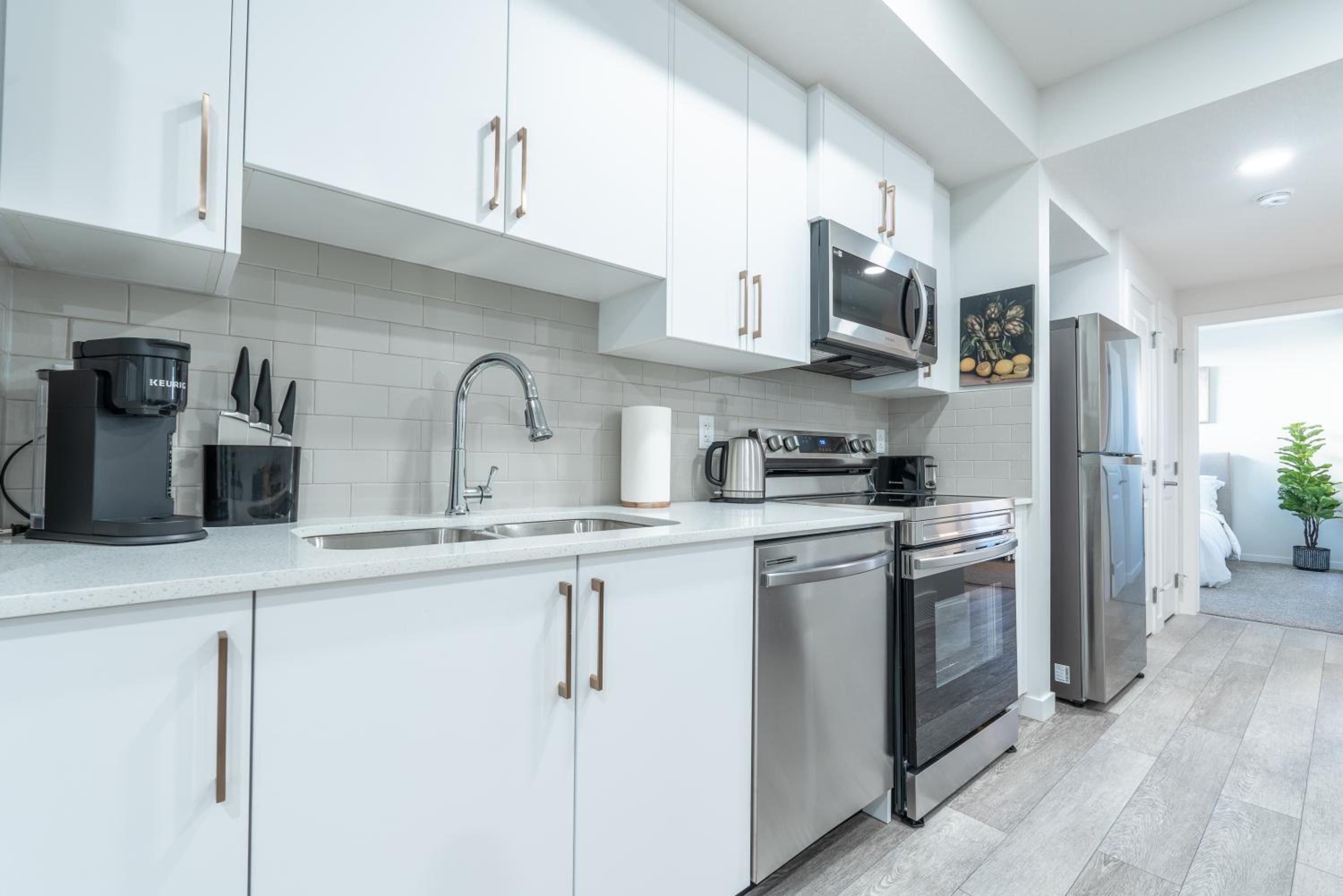 Stylish Getaway 2BD Basement by YMCA and South Health Campus Hospital