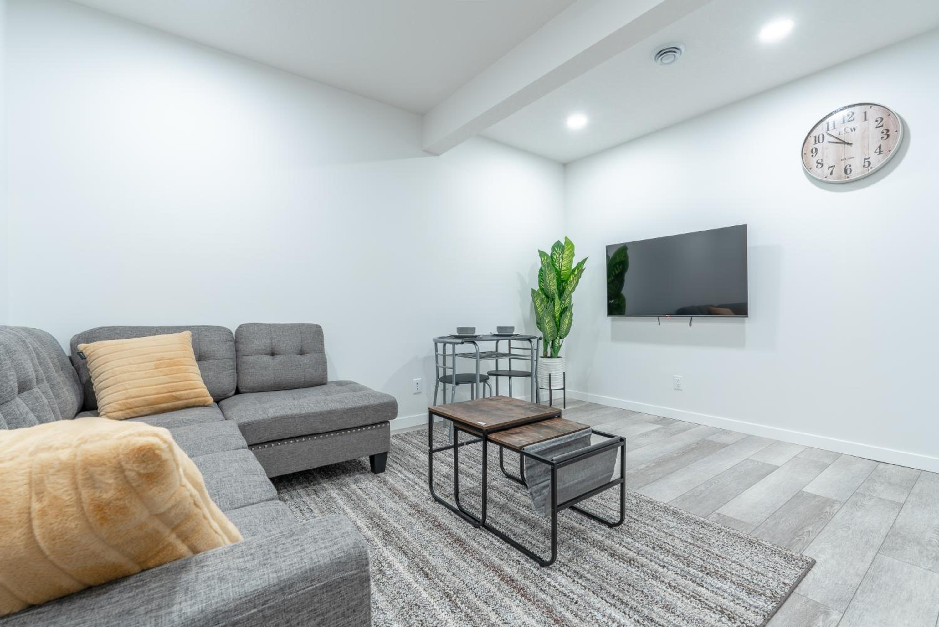 Stylish Getaway 2BD Basement by YMCA and South Health Campus Hospital