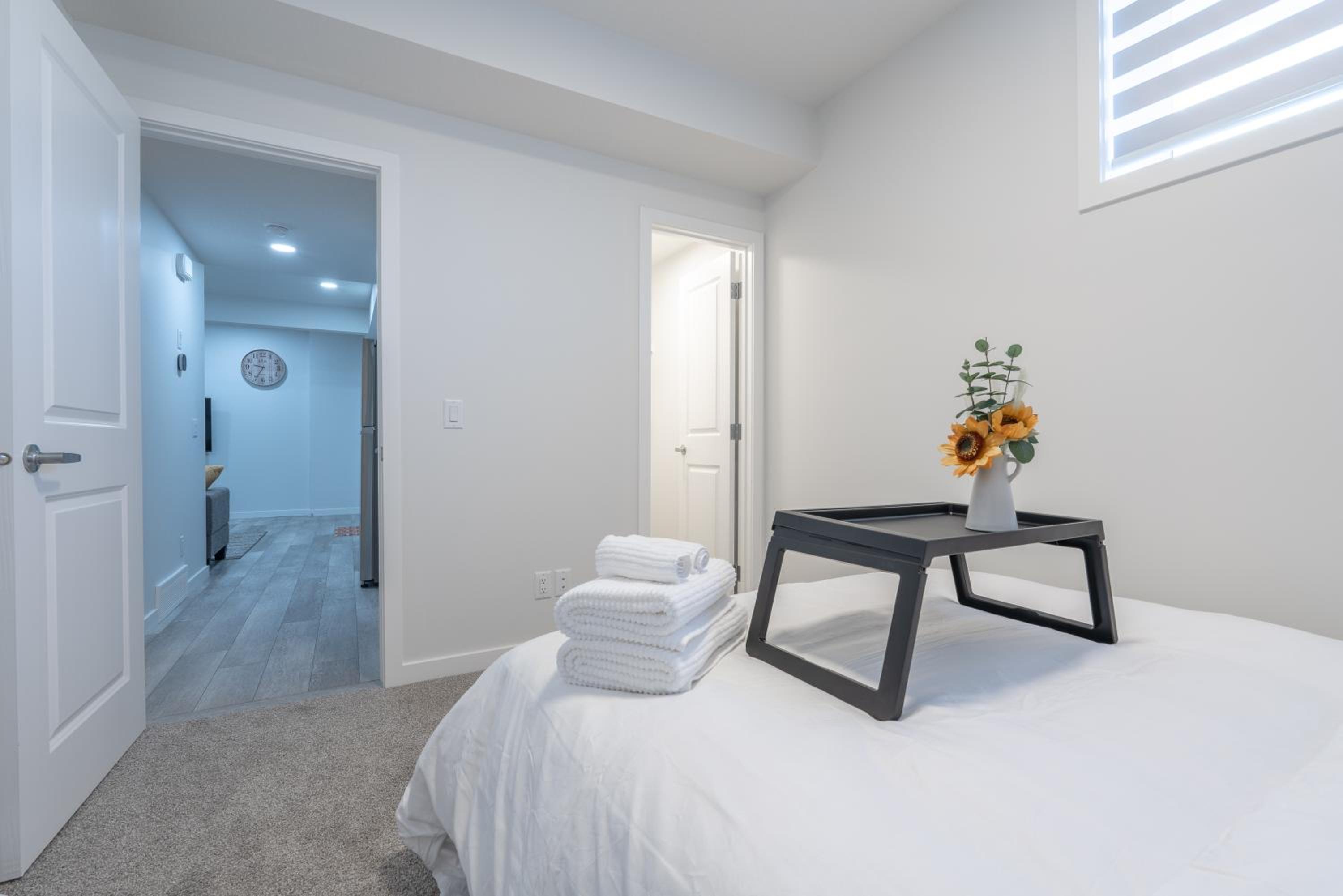 Stylish Getaway 2BD Basement by YMCA and South Health Campus Hospital