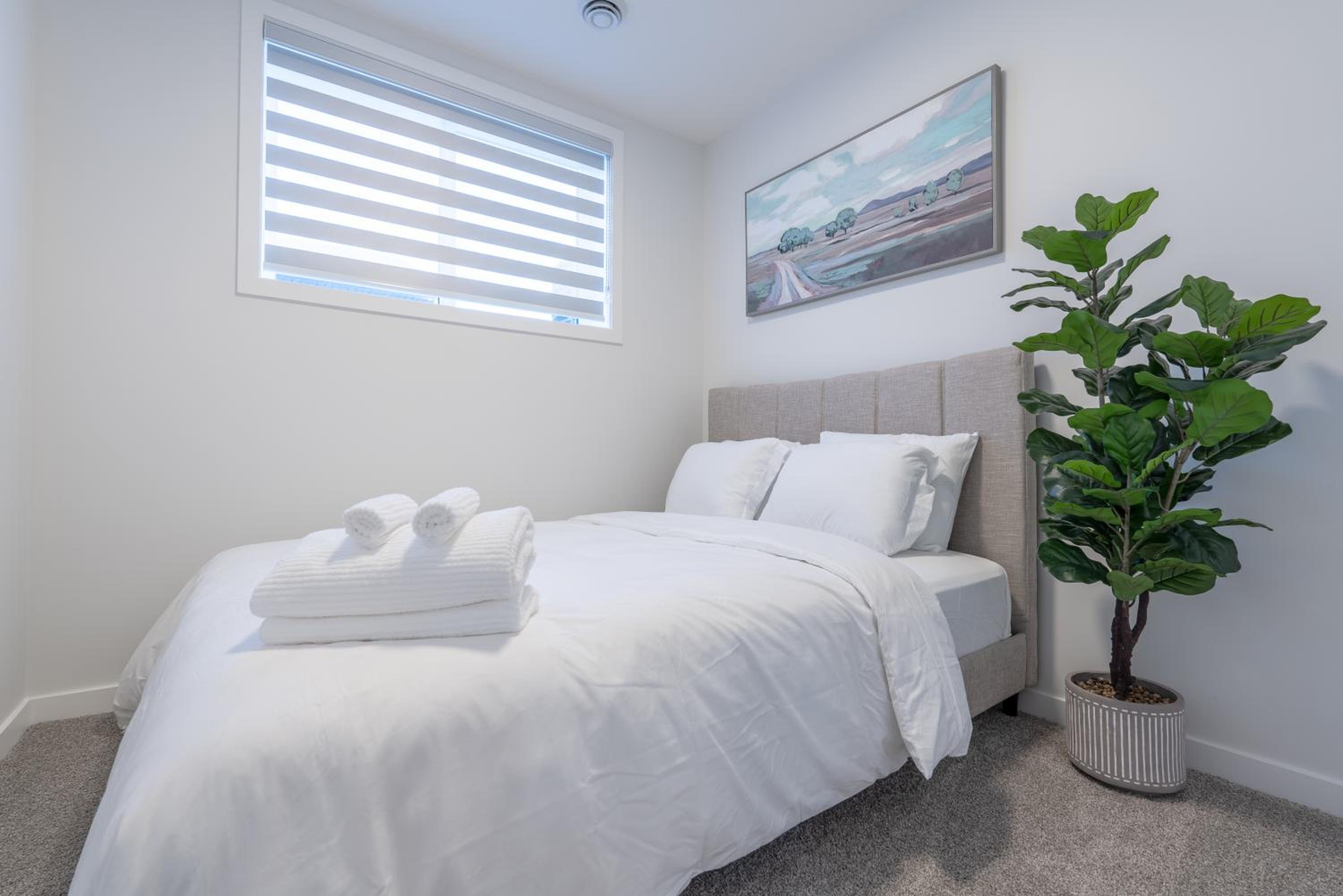 Stylish Getaway 2BD Basement by YMCA and South Health Campus Hospital