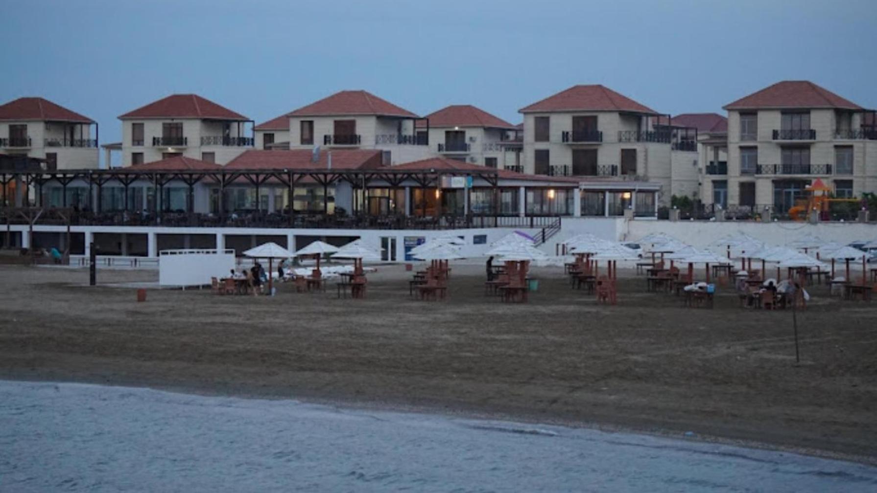 S Pollo Apartments by first beach line