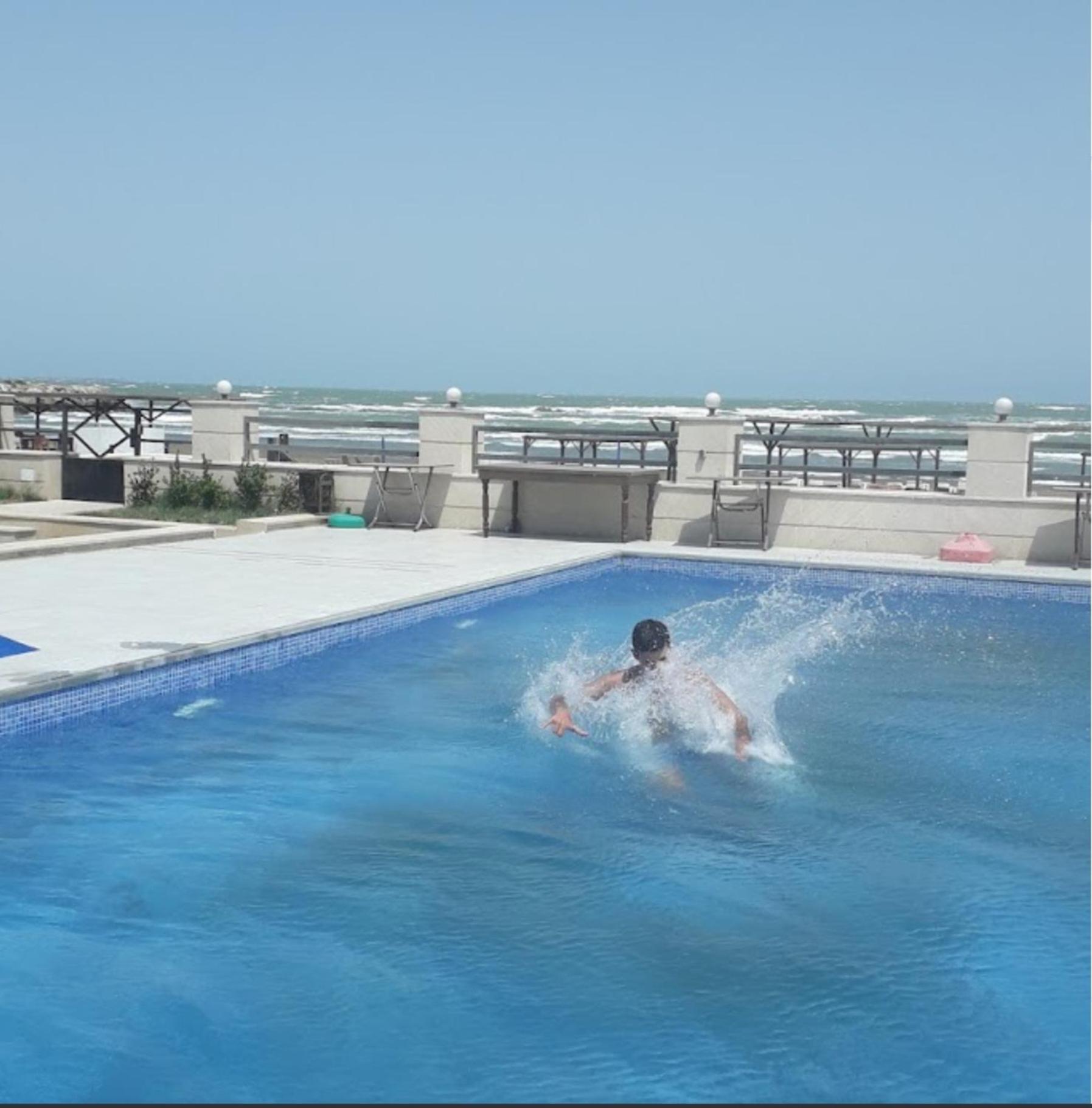 S Pollo Apartments by first beach line