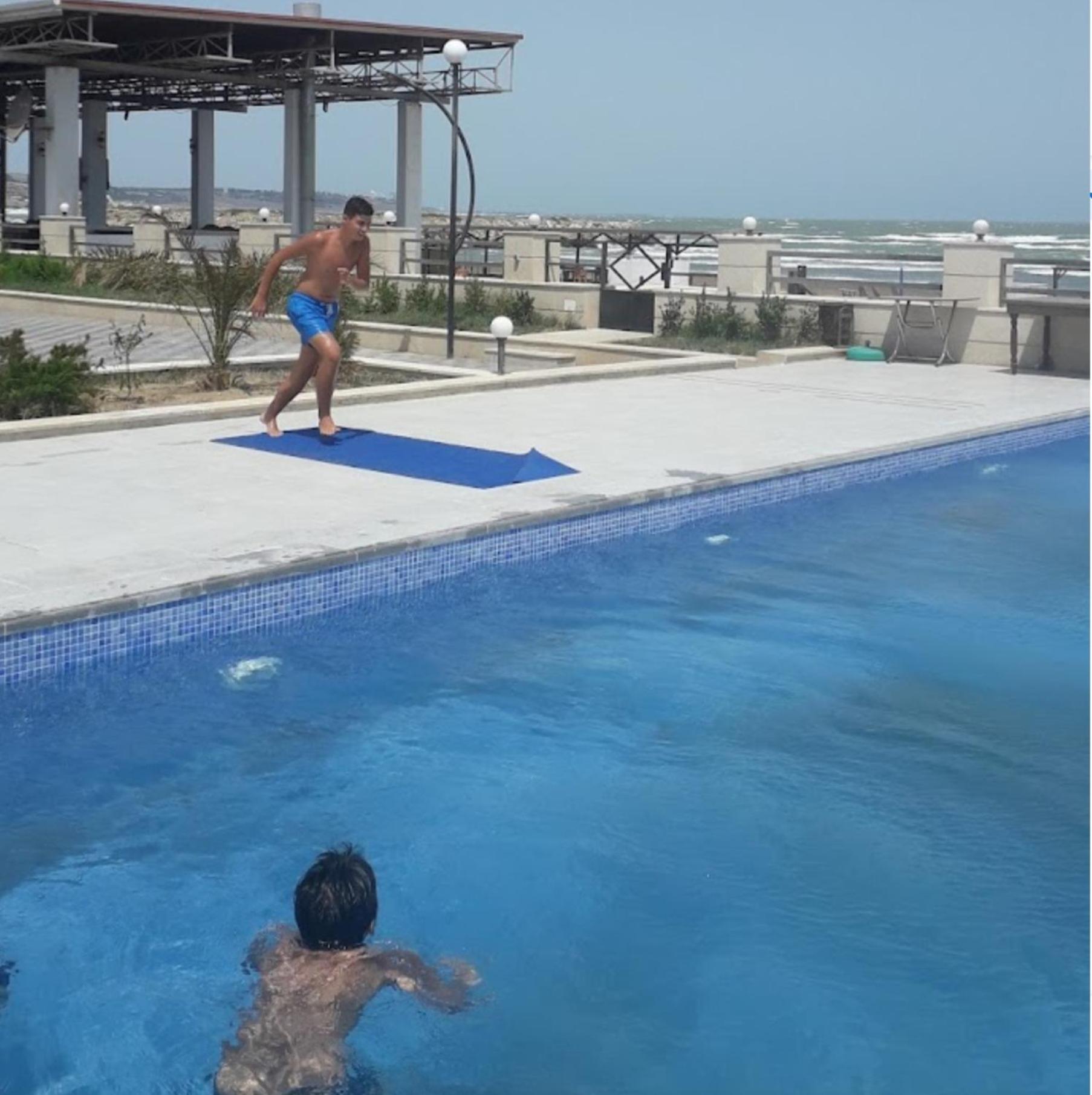 S Pollo Apartments by first beach line
