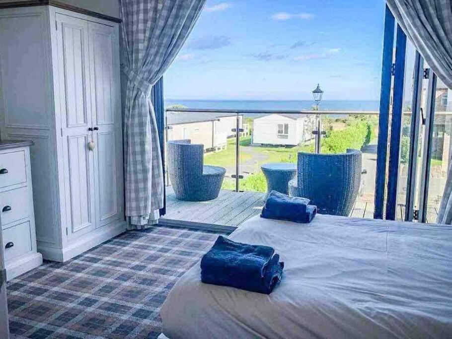 Sea view The Lookout at The Bay holiday village Filey 2 bed sleeps 5 dog friendly free leisure facilities direct beach access pub and shop click to view ph view 2