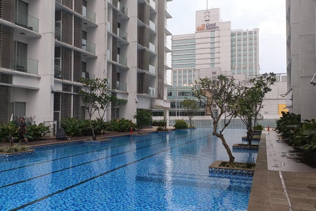 Cozy M Suites Android Box, Pool and City Area