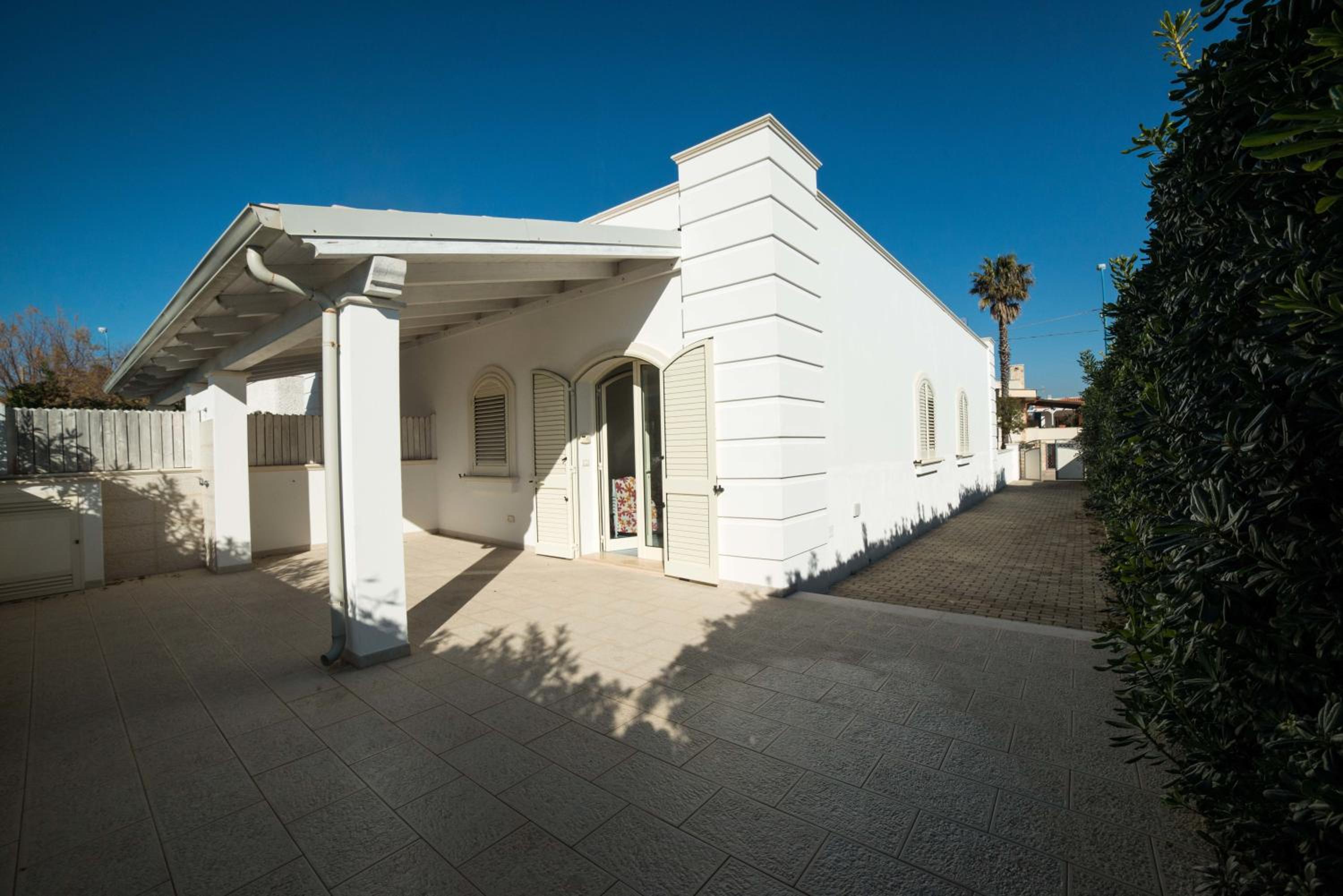 Le Bianche ville con patio privato a un passo dal mare