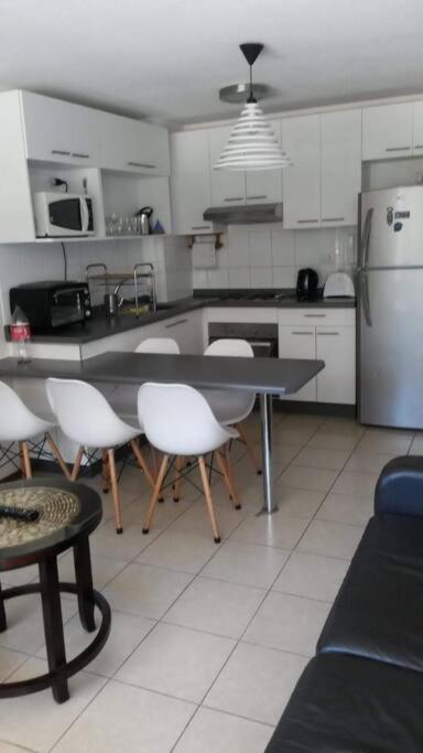 Hermoso departamento en condominio frente al mar