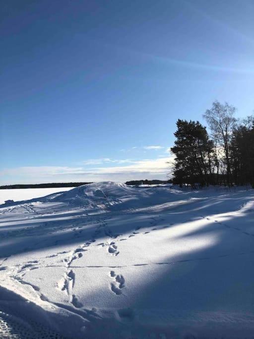 Tunnelmallinen kaksio hirsitalossa