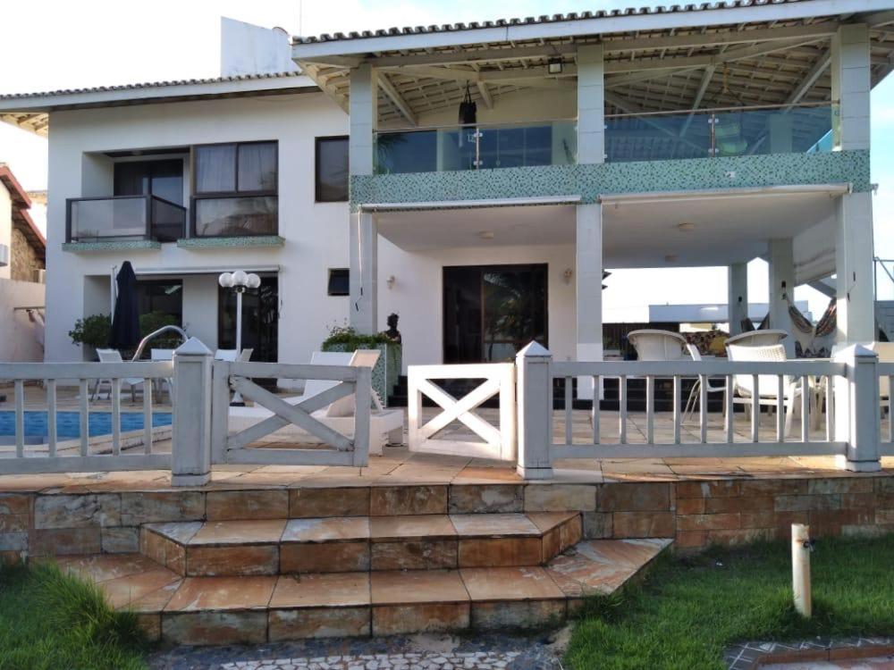 Casa em condomínio em frente mar