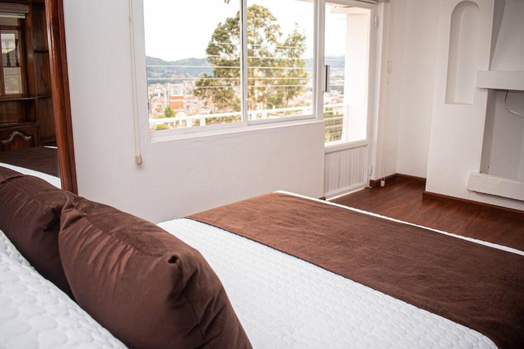 Hermosa casa con lujoso rooftop en Cuenca