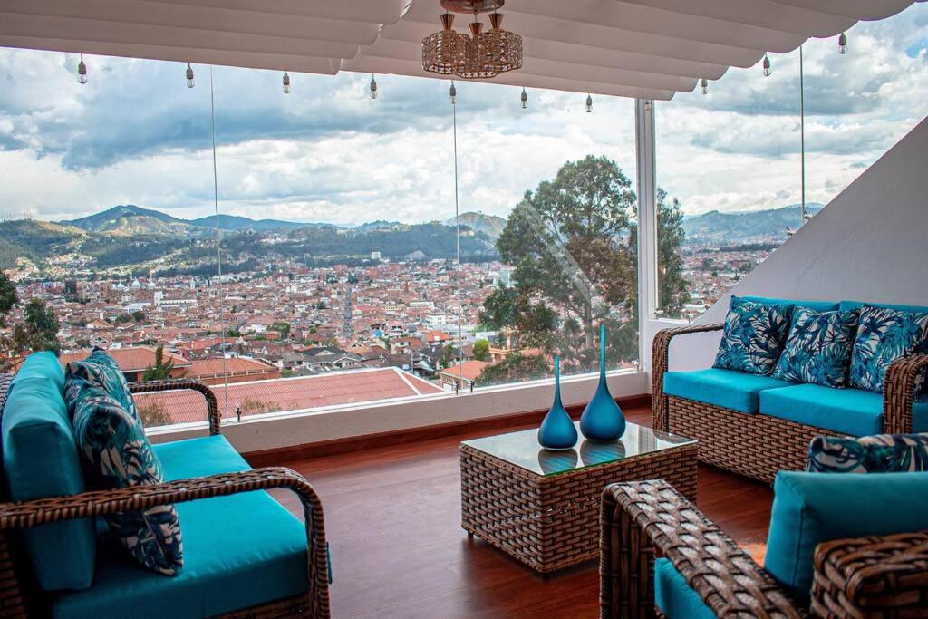 Hermosa casa con lujoso rooftop en Cuenca