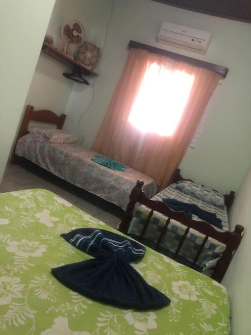 Casa próximo a praia com churrasqueira e ar condicionado!