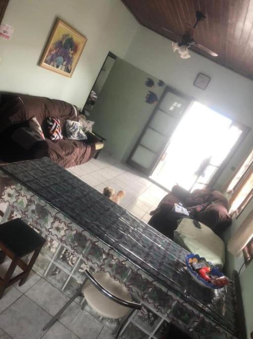 Casa próximo a praia com churrasqueira e ar condicionado!