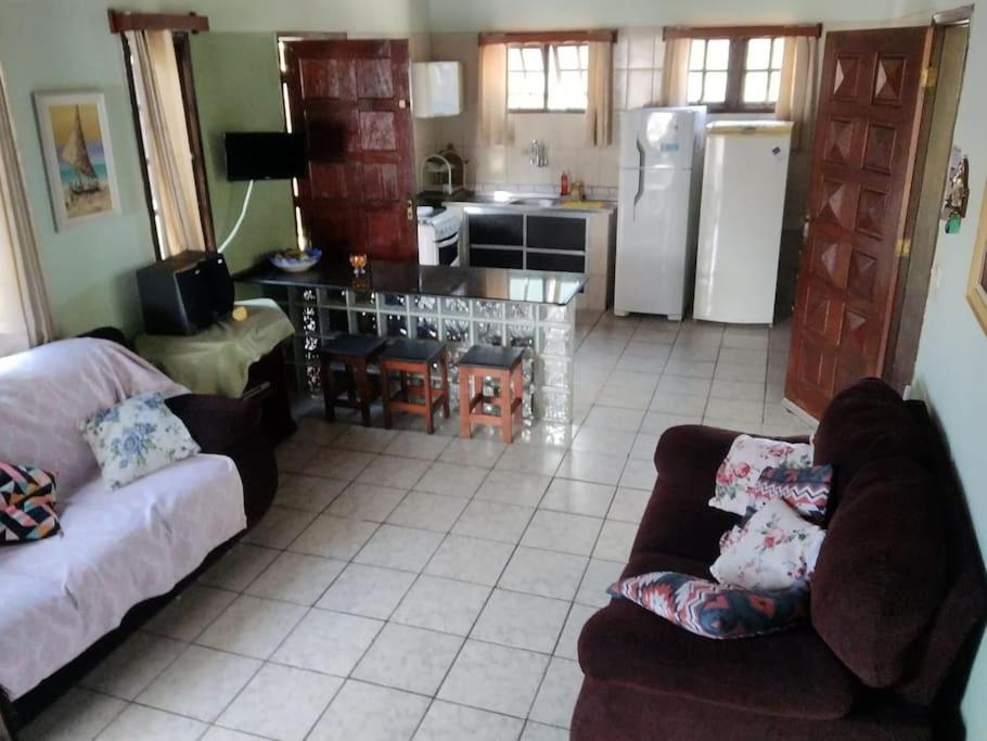 Casa próximo a praia com churrasqueira e ar condicionado!