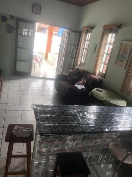 Casa próximo a praia com churrasqueira e ar condicionado!