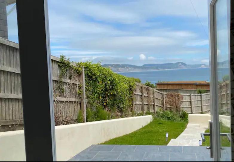 Stunning little house, 2 mins from Lyme Regis beach with a sea view Sleeps 4 free parking,small dog welcome view 5