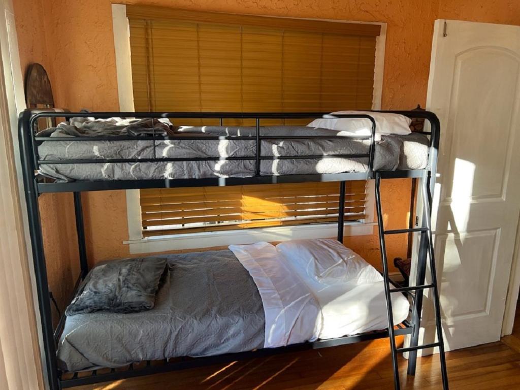 Luxury 8BR Entire Mini-Resort with Heated Pool, Tiki Bar - Tropical Paradise Near Beach!