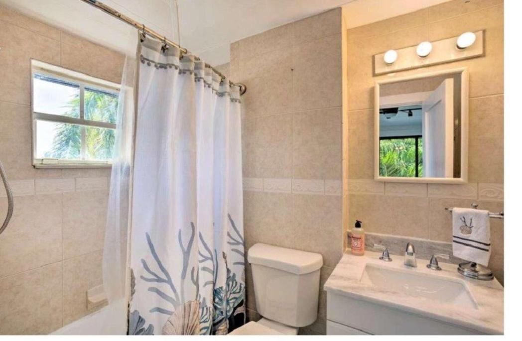 Luxury 8BR Entire Mini-Resort with Heated Pool, Tiki Bar - Tropical Paradise Near Beach!