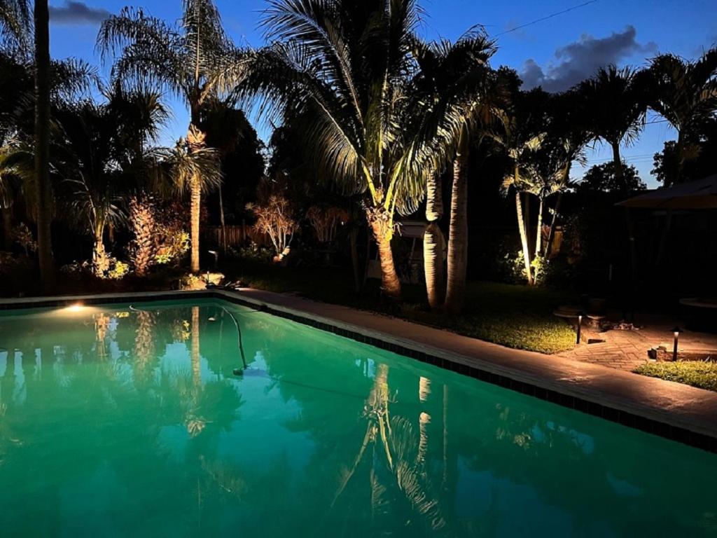 Luxury 8BR Entire Mini-Resort with Heated Pool, Tiki Bar - Tropical Paradise Near Beach!
