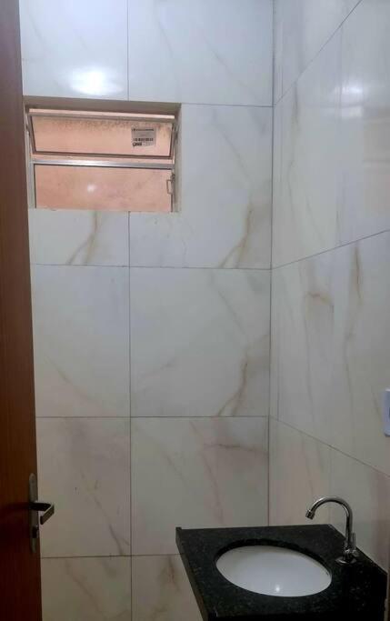 casa com ar condicionado e garagem