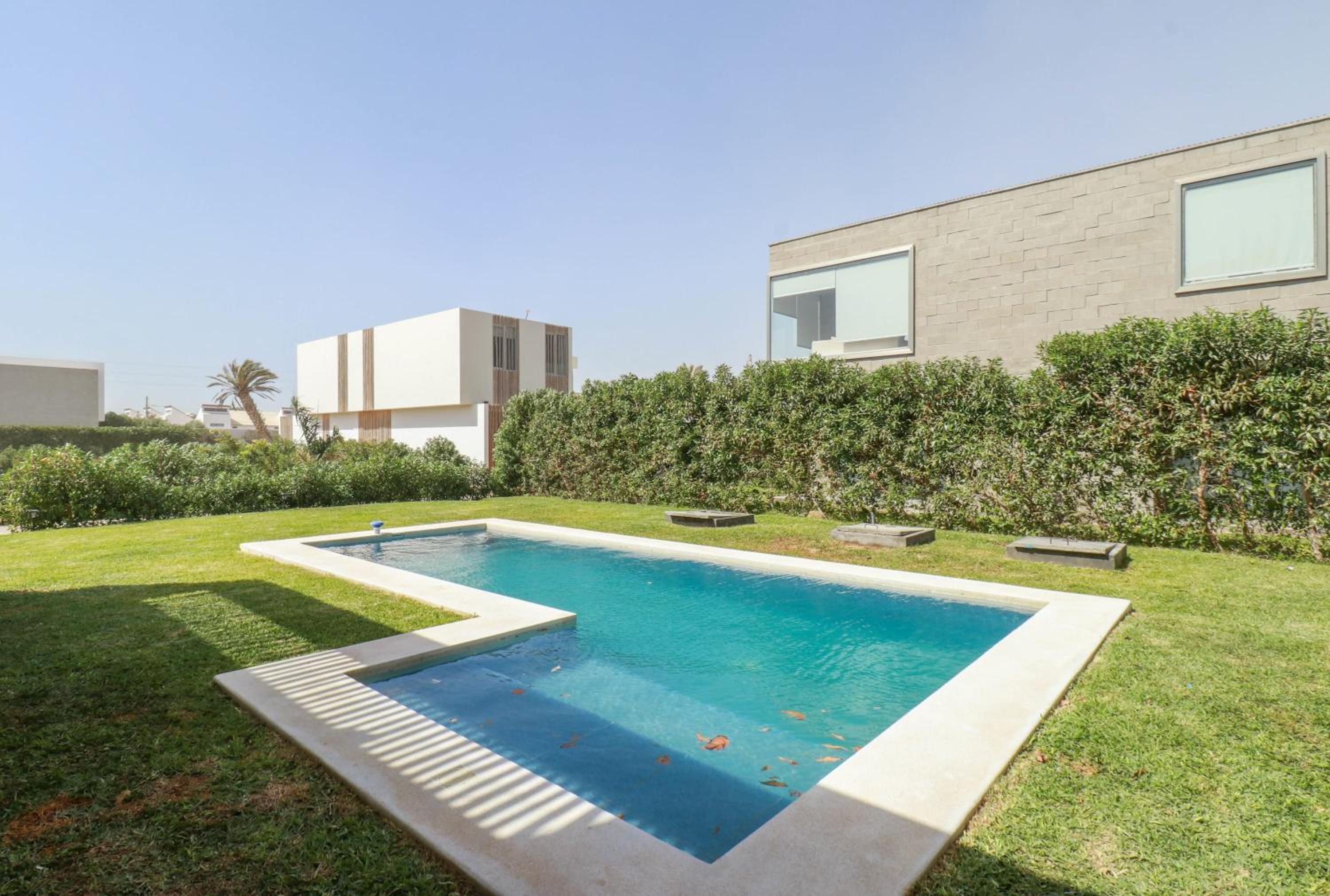 J Home 4BR with Private Pool in Paracas by Wynwood House view 4