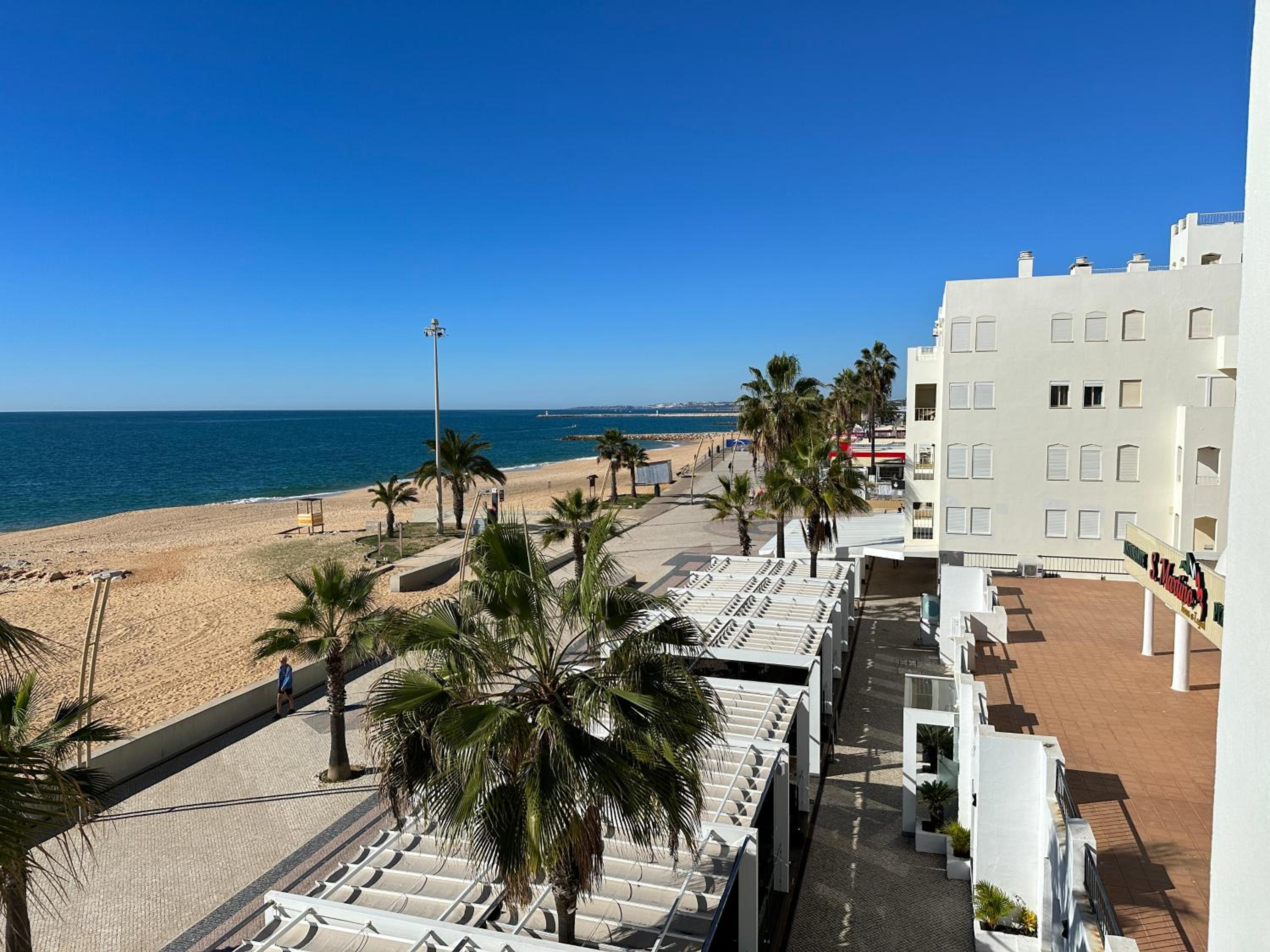 Sea View Quarteira Apartment by Trip2Portugal