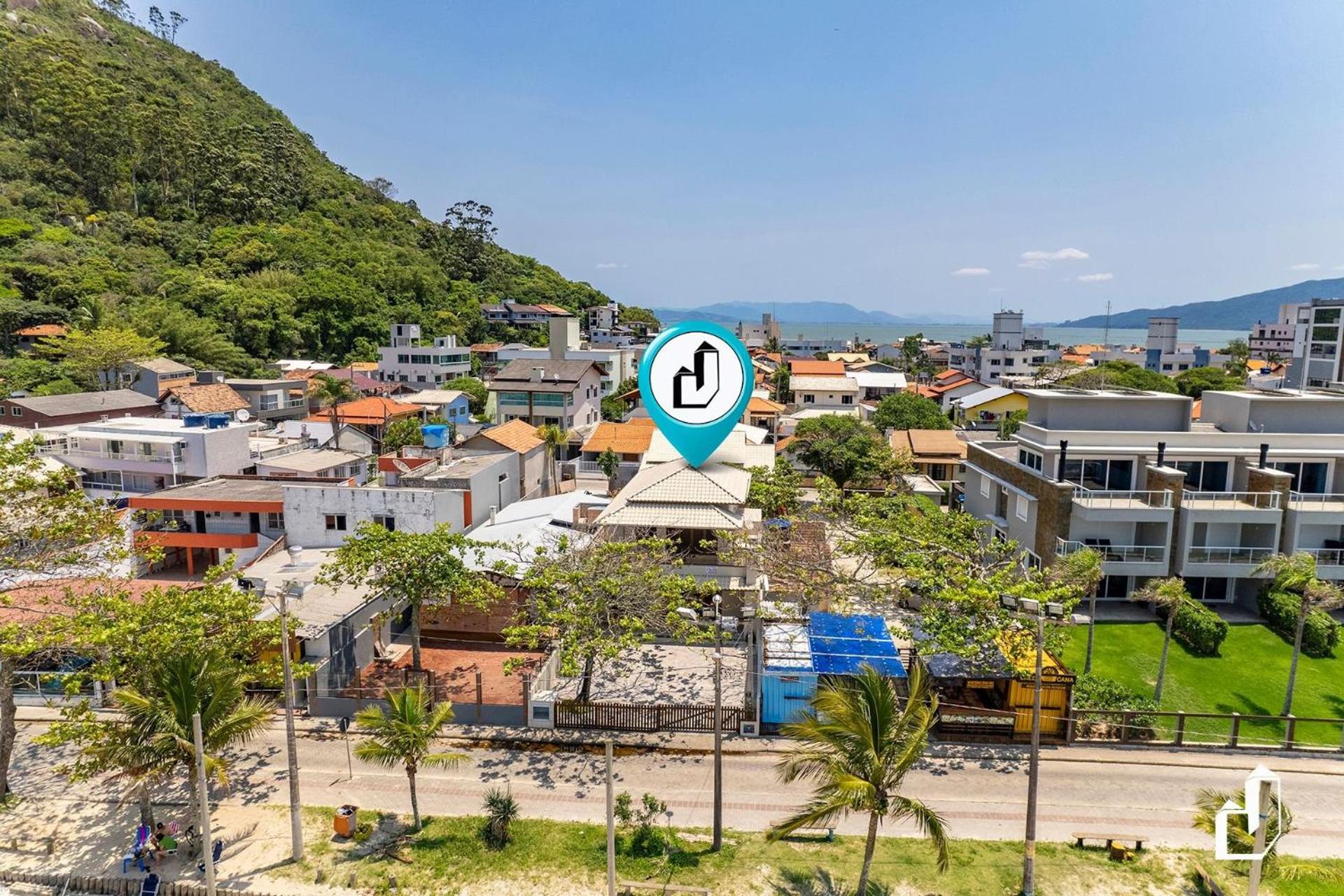 Frente ao mar e próxima a comércios 04 dormitórios