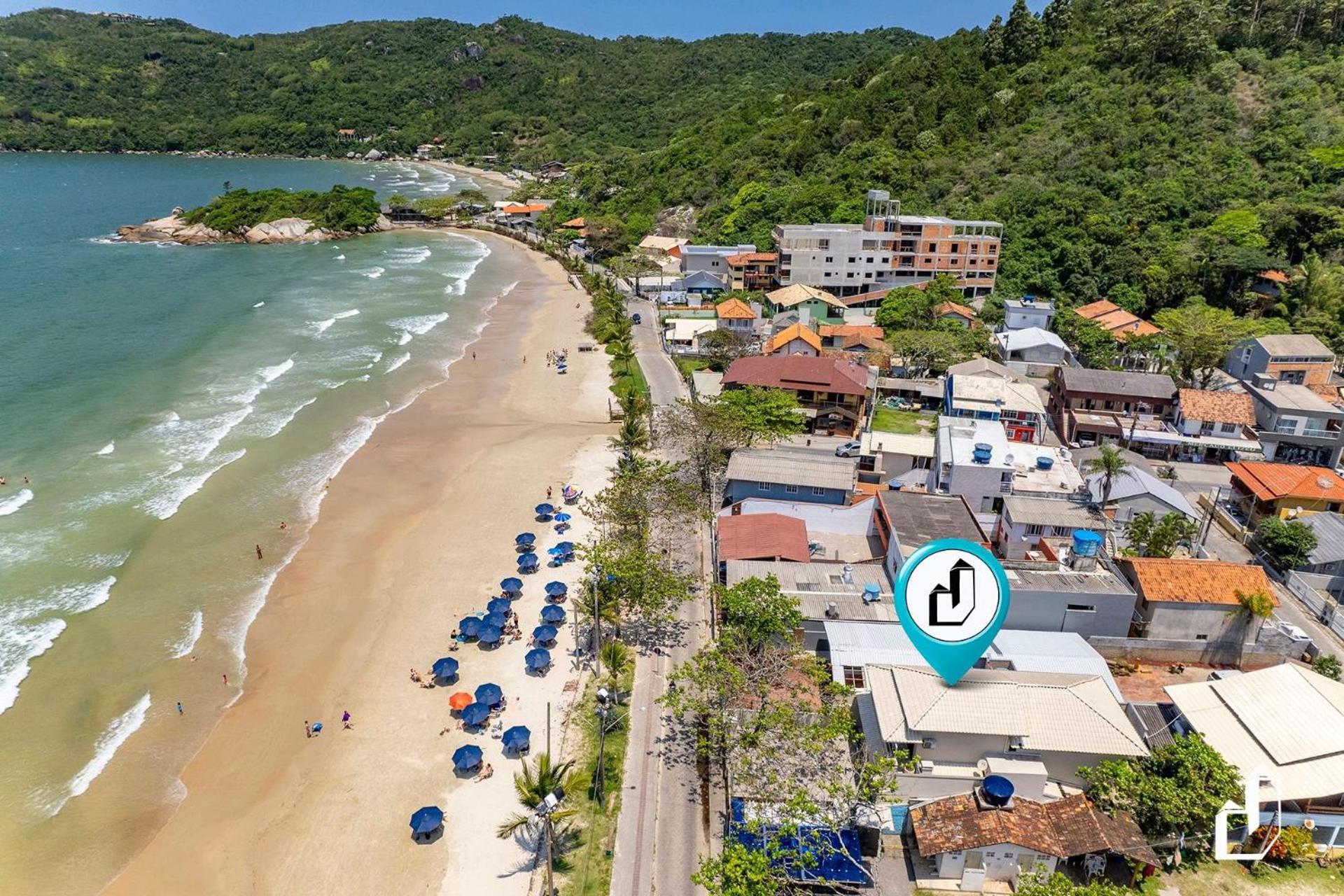 Frente ao mar e próxima a comércios 04 dormitórios
