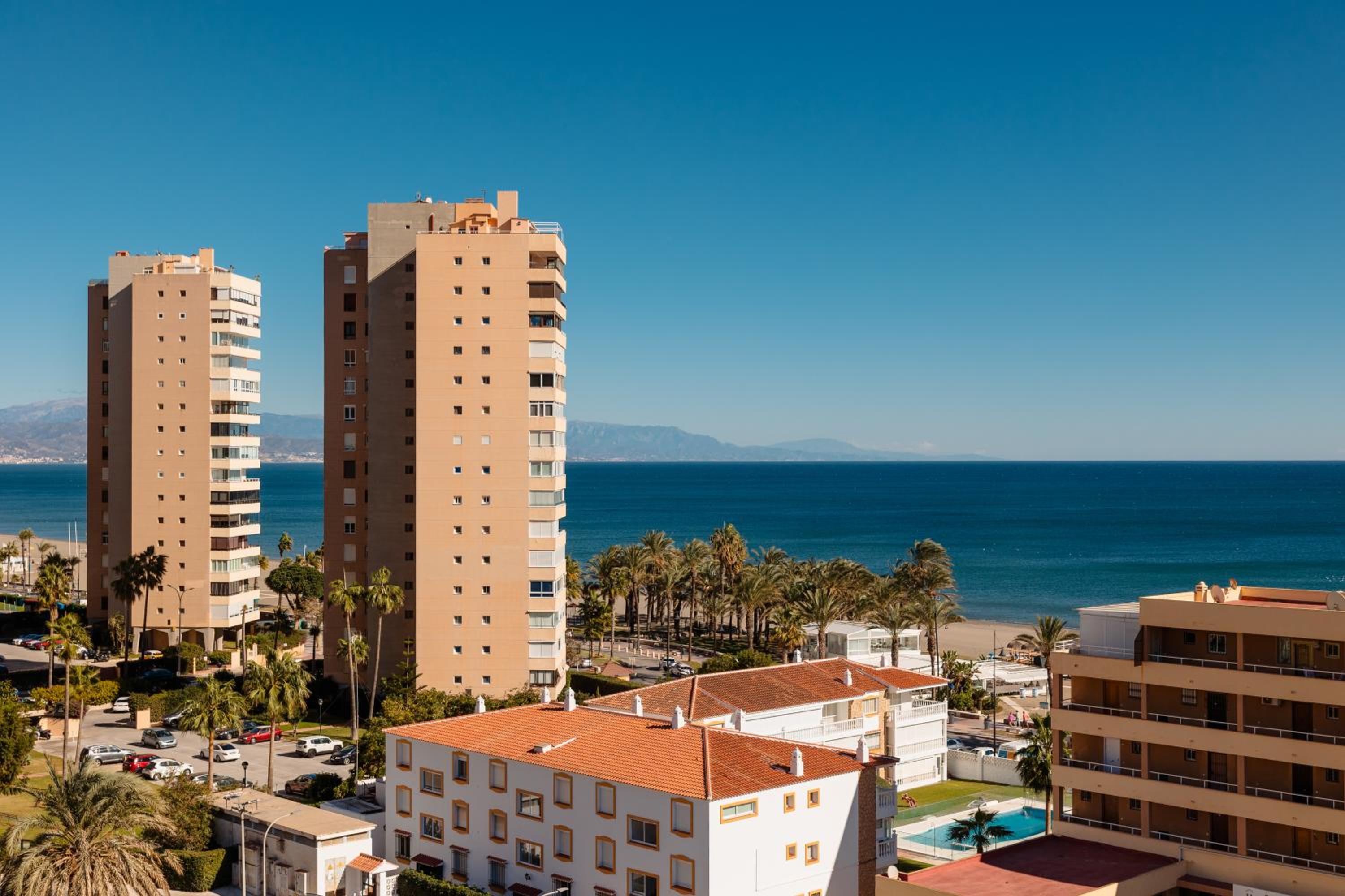 Beachfront apartment with panoramic sea views, private parking, swimming pools and mini golf