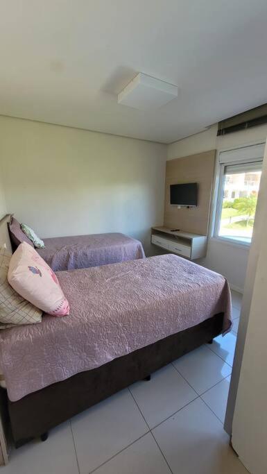 Suas férias com todo conforto PÉ NA AREIA