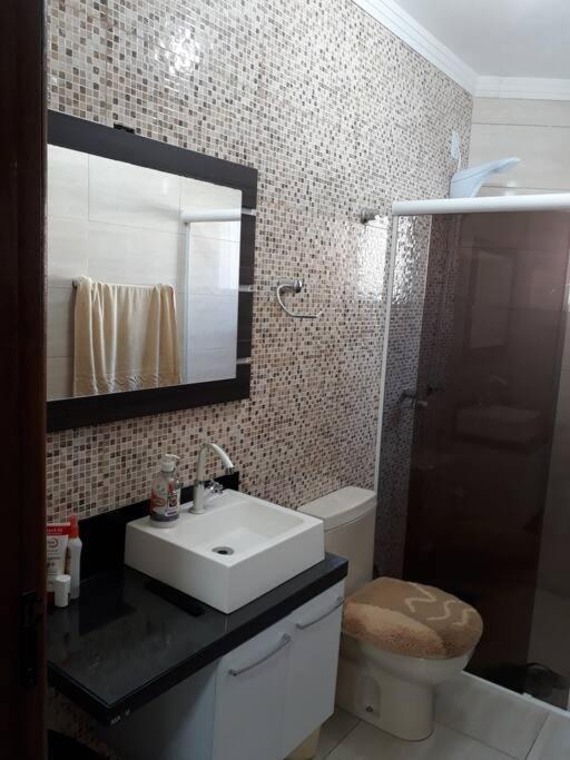 Casa com piscina / Na quadra do mar Torres-RS