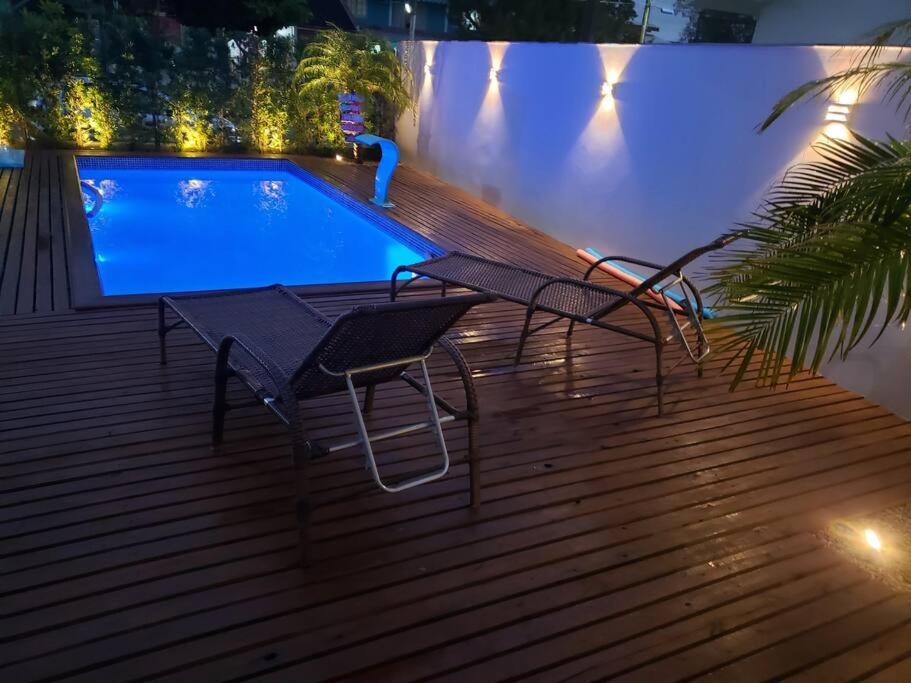 Casa com piscina / Na quadra do mar Torres-RS