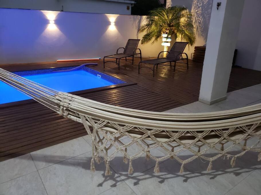 Casa com piscina / Na quadra do mar Torres-RS