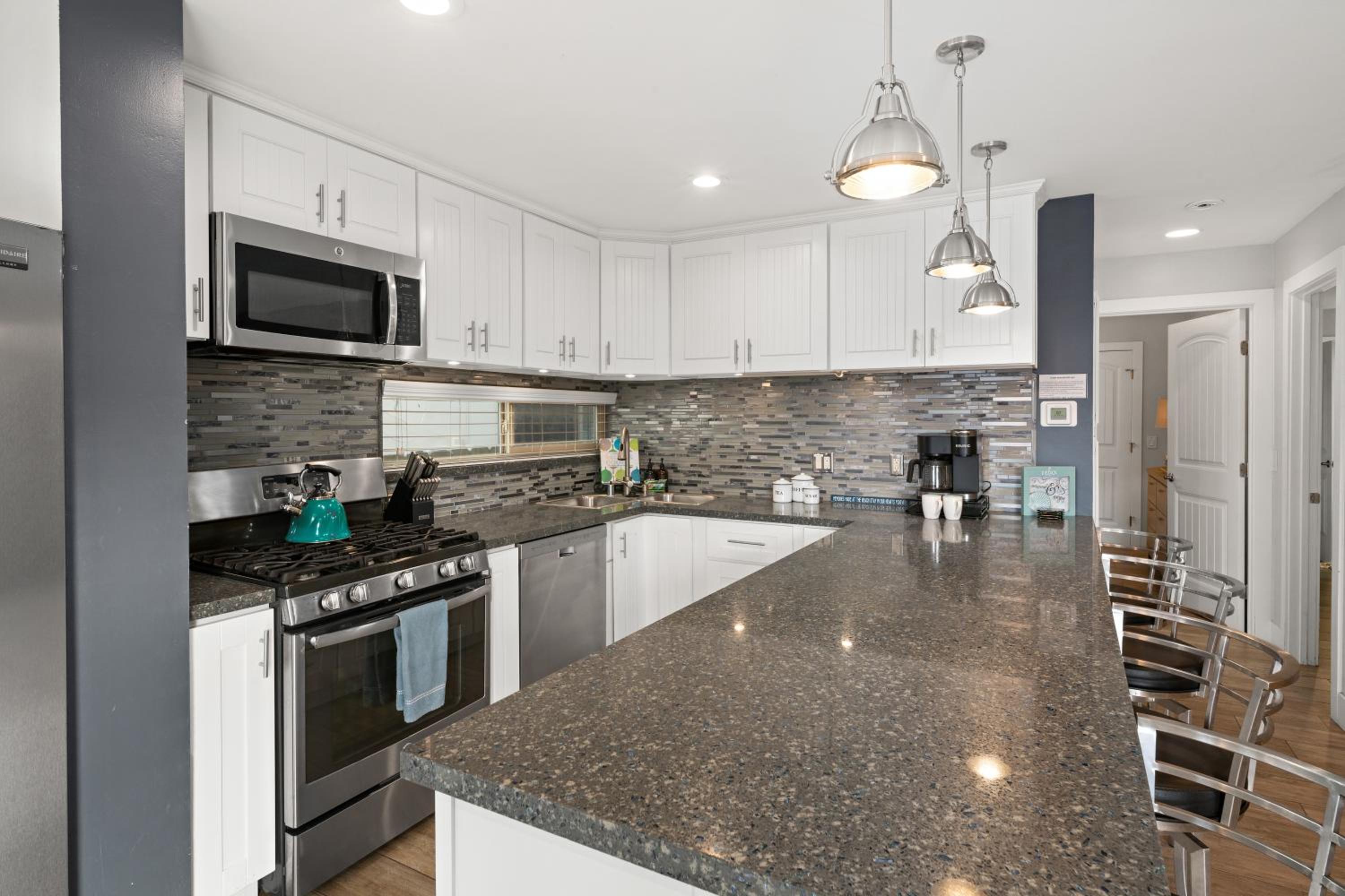 Stunning Beach Home - large patio, parking, ac & dog friendly! view 3