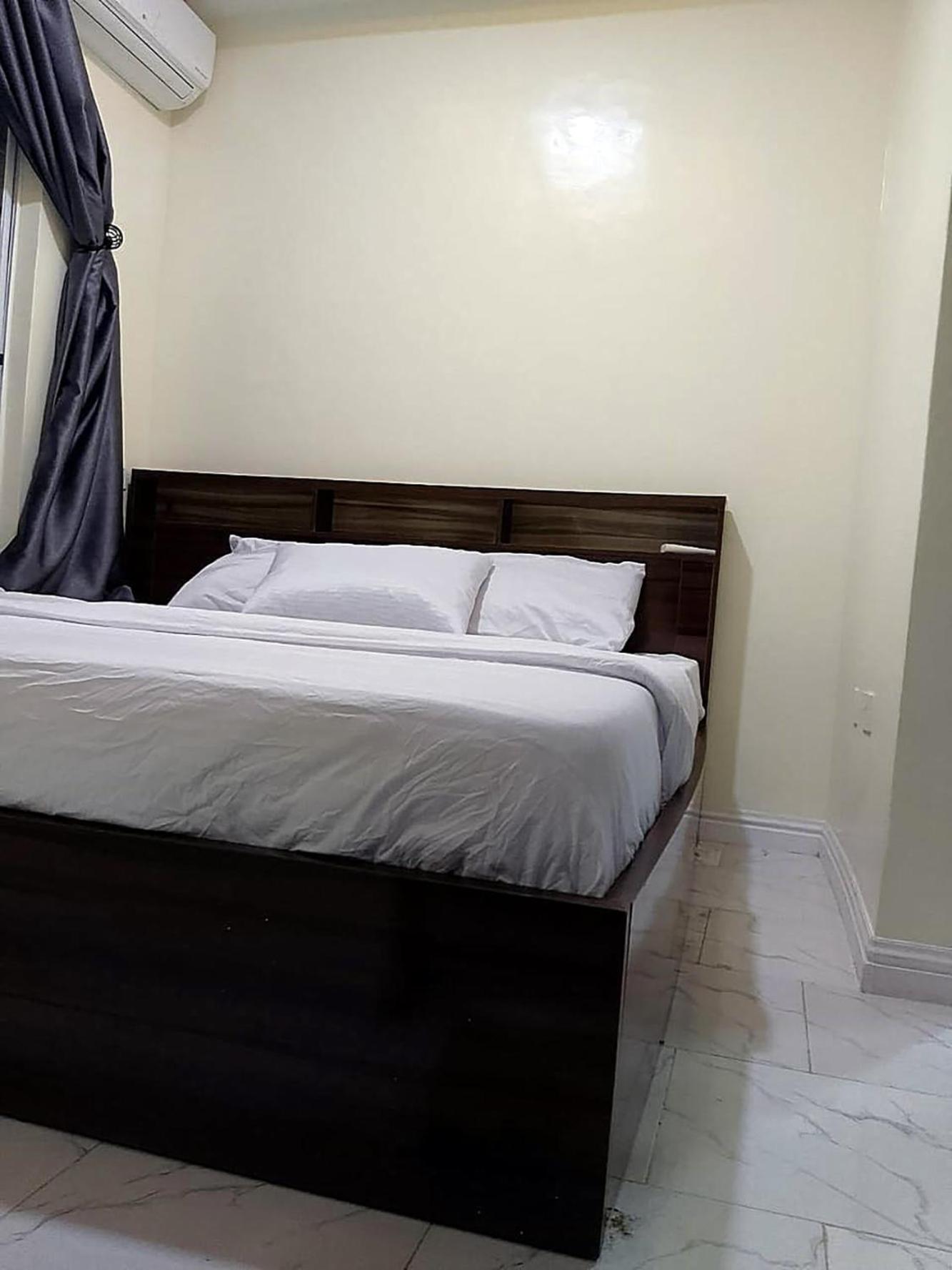 JKA 2-BEDROOM-Apt 24HRS POWER Unlimited WIFI , GARDEN PATIO AREA,FREE DAILY HOUSEKEEPING view 4