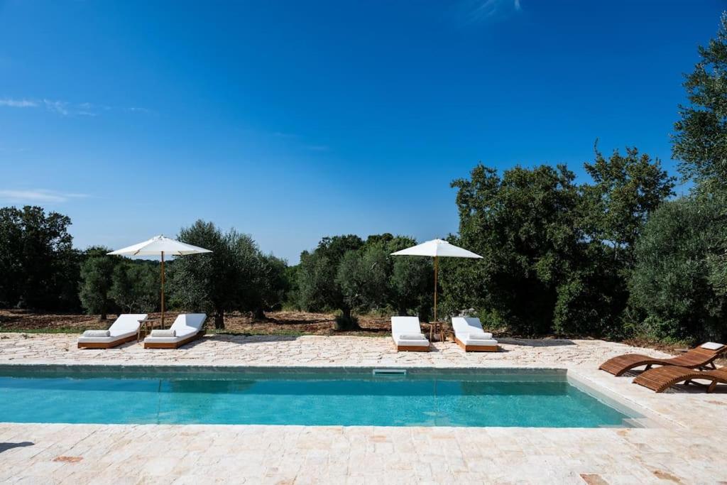 Trullo Elaia - Dimora di charme in Valle d'Itria con piscina