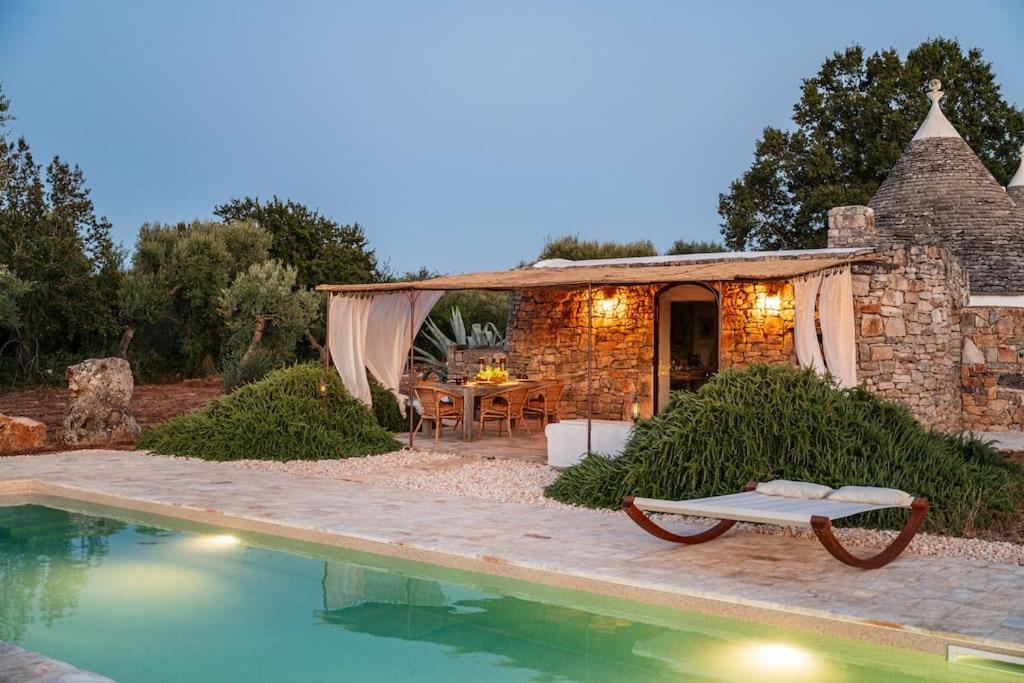 Trullo Elaia - Dimora di charme in Valle d'Itria con piscina