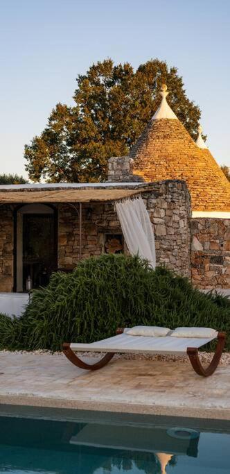 Trullo Elaia - Dimora di charme in Valle d'Itria con piscina