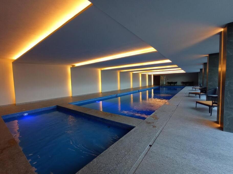 Bello departamento privado con alberca climatizada y gimnasio view 2