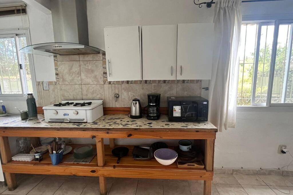 Cosquín Casa a metros del río con pileta - Hasta 12 personas