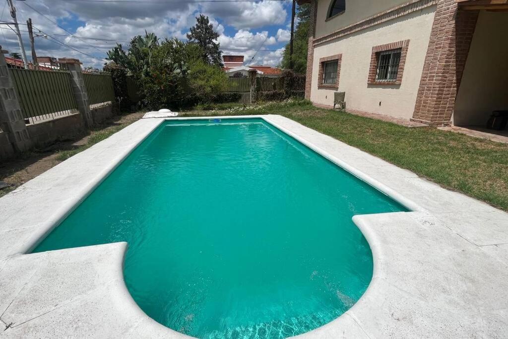 Cosquín Casa a metros del río con pileta - Hasta 12 personas