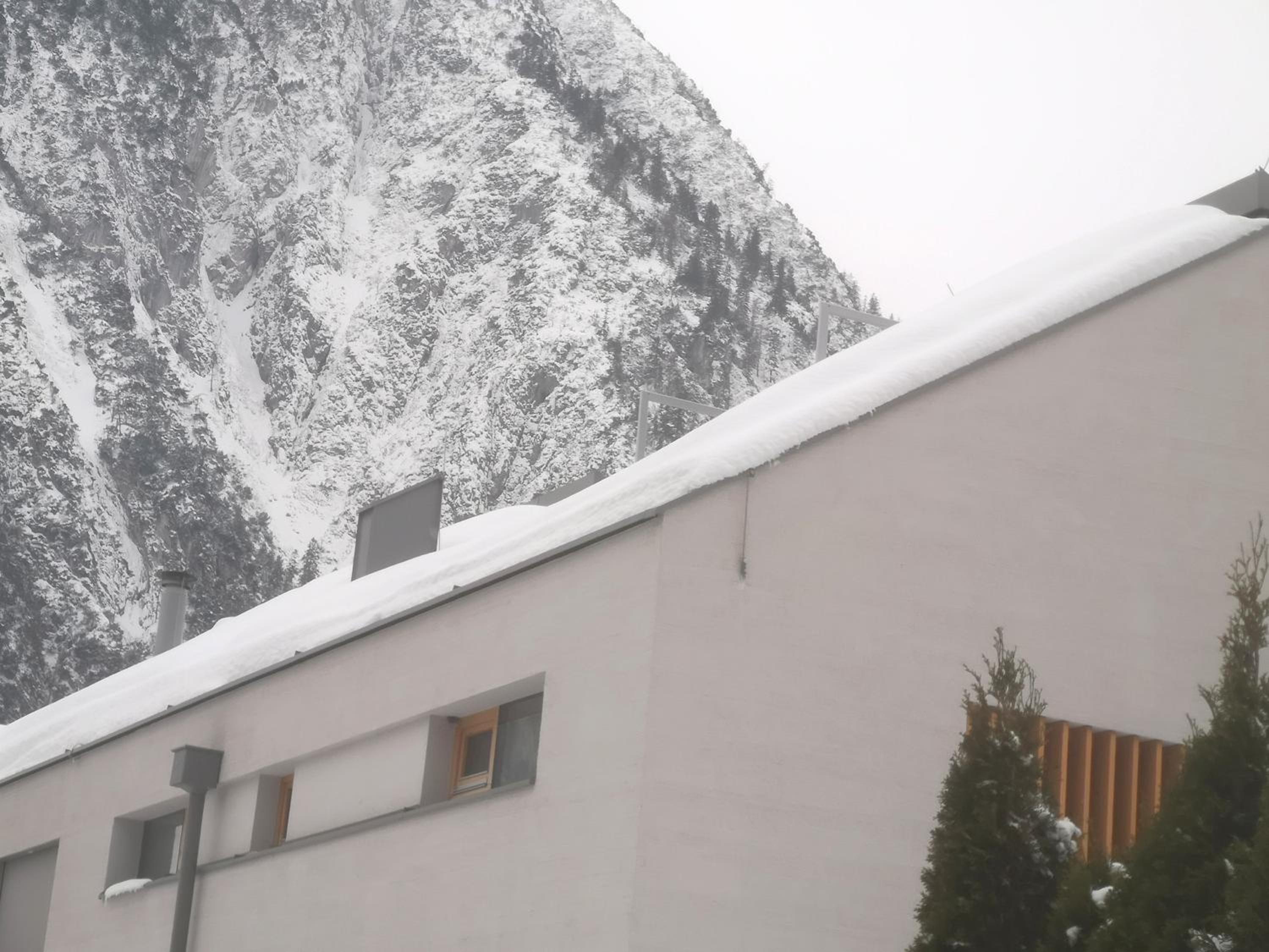 Modern Alpine Penthouse with Lake View